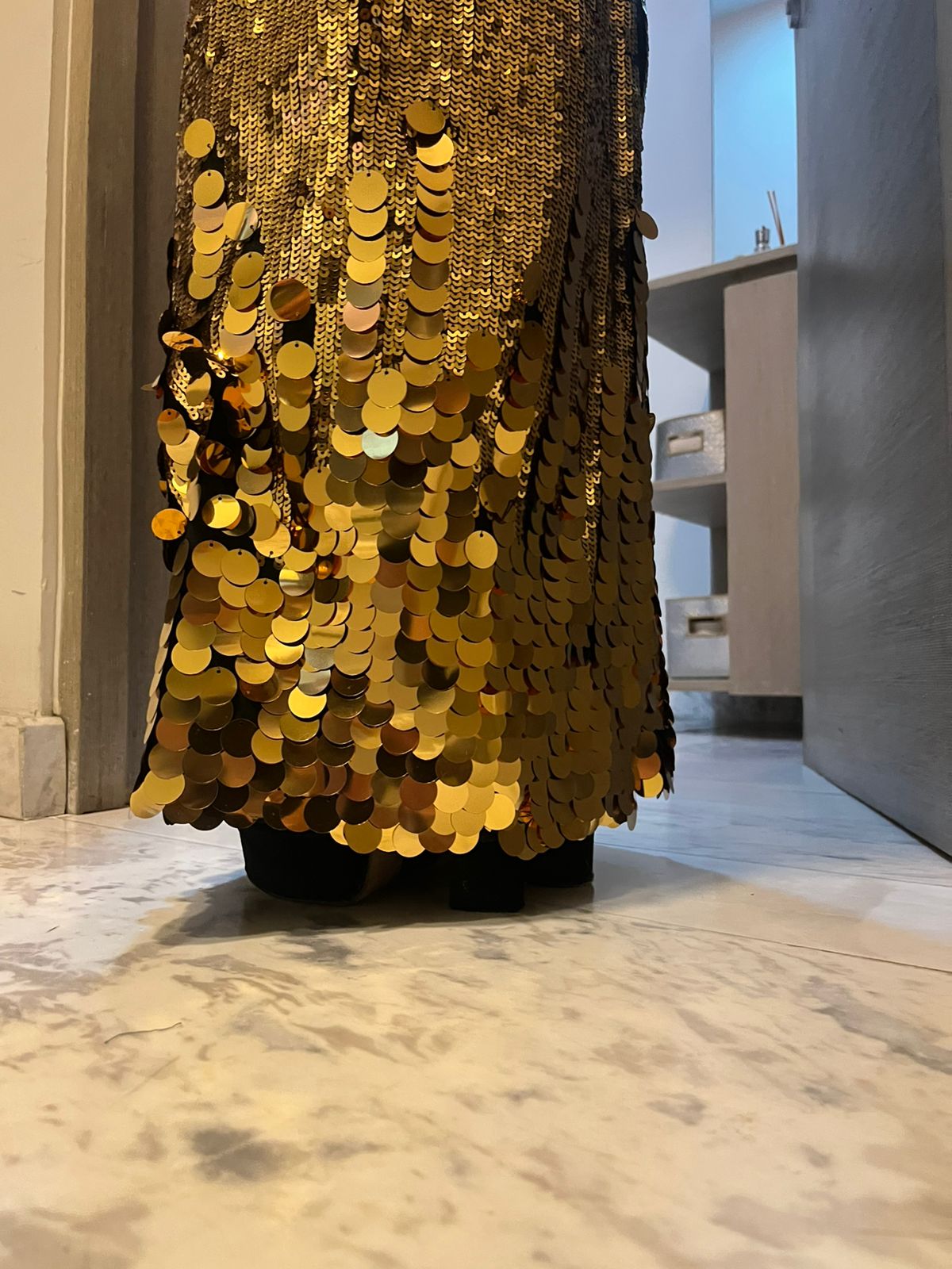 Vestido de lentejuela dorada, alta costura